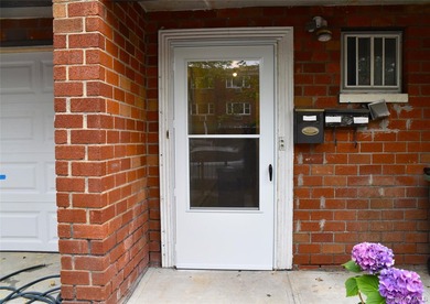Baychester Area Updated 2 Family Brick attached Home with a - photo 4