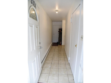Baychester Area Updated 2 Family Brick attached Home with a - photo 5