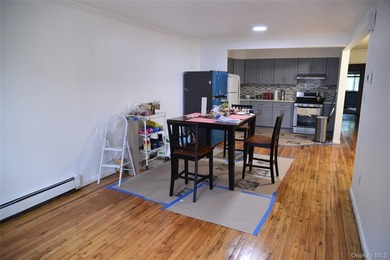 Baychester Area Updated 2 Family Brick attached Home with a - photo 8