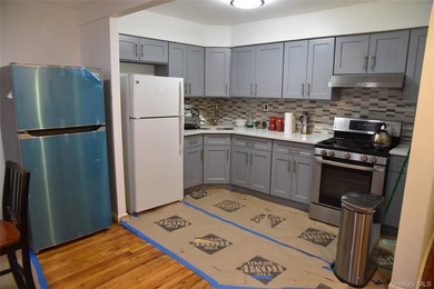 Baychester Area Updated 2 Family Brick attached Home with a - photo 9