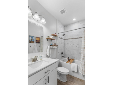 Don't miss this absolutely stunning nearly new 3 Bedroom plus - photo 8