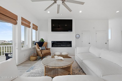 Perched high on one of the most elevated homesites on Topsail