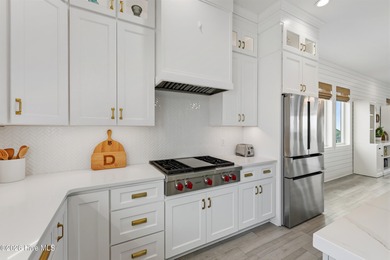 Perched high on one of the most elevated homesites on Topsail