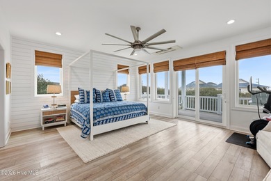 Perched high on one of the most elevated homesites on Topsail