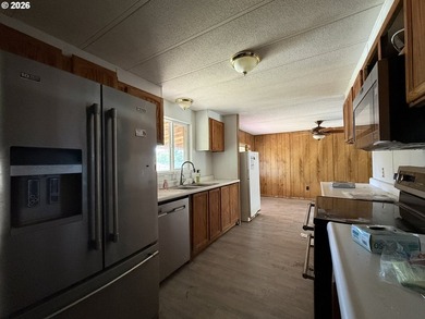 This spacious 1,800+ square foot manufactured home offers an - photo 8