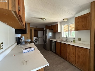 This spacious 1,800+ square foot manufactured home offers an - photo 9