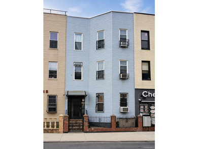 An exciting opportunity to own a substantial three family - photo 1