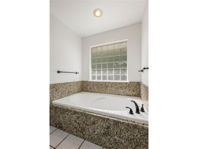 One-owner, custom built gem tucked on a quiet cul-de-sac! This