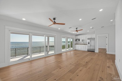 Few homes capture waterfront living like this. Behind the gates - photo 50