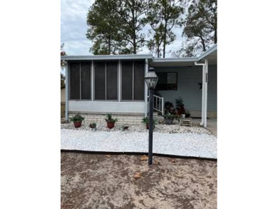 Welcome to this well kept 2 bedroom, 2 bathroom manufactured - photo 3