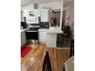 Welcome to this well kept 2 bedroom, 2 bathroom manufactured - photo 7