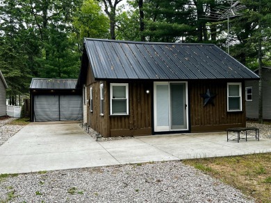 Lake Home For Sale in Prudenville, Michigan
