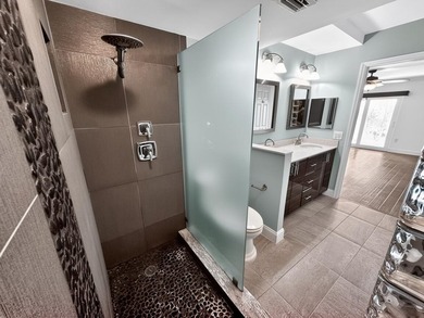 Welcome to tranquil living within the City of Atlantis. This - photo 14
