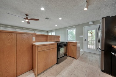 Sitting on the water in Hideaway Lake, this spacious 4-bedroom - photo 12