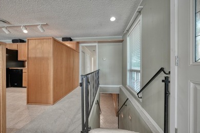 Sitting on the water in Hideaway Lake, this spacious 4-bedroom - photo 16