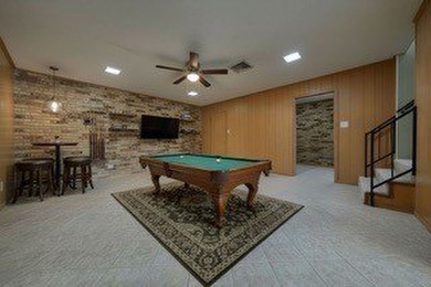 Sitting on the water in Hideaway Lake, this spacious 4-bedroom - photo 33