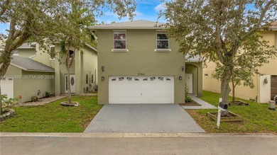 Lake Home For Sale in Coconut Creek, Florida