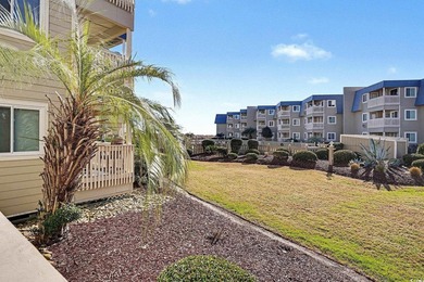This bright two-bedroom, two-bath condominium is perched in a - photo 2