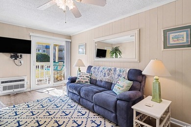 This bright two-bedroom, two-bath condominium is perched in a - photo 3
