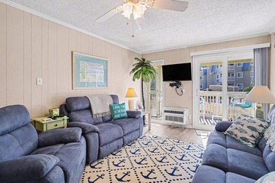 This bright two-bedroom, two-bath condominium is perched in a - photo 4