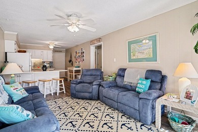 This bright two-bedroom, two-bath condominium is perched in a - photo 5