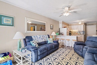 This bright two-bedroom, two-bath condominium is perched in a - photo 6