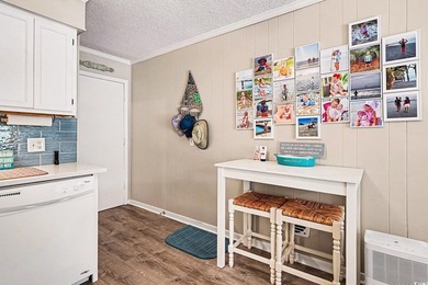 This bright two-bedroom, two-bath condominium is perched in a - photo 9