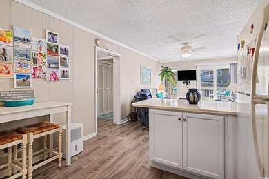 This bright two-bedroom, two-bath condominium is perched in a - photo 10