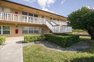 Beautifully remodeled 2BR/1.5BA upstairs corner condo with water - photo 12