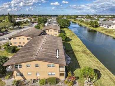 Beautifully remodeled 2BR/1.5BA upstairs corner condo with water - photo 13