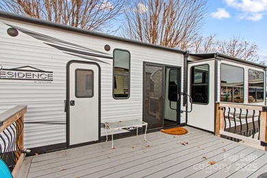 Escape to effortless lakeside living with this beautifully - photo 2
