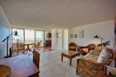 Enjoy ocean and Hilo Bay views from this oceanfront, corner unit - photo 1