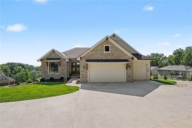A stunning reverse ranch loaded with custom upgrades. Step - photo 2