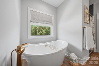 Custom home in a gated community, offering access to lake - photo 24