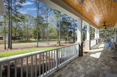 Modern comfort meets relaxed lake living on this spacious 1-acre - photo 6