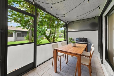 Welcome to 84 Conaskonk Circle in Royal Palm Beach, a bright and - photo 18