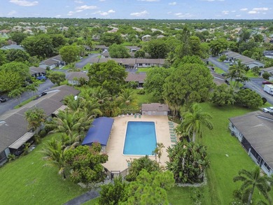 Welcome to 84 Conaskonk Circle in Royal Palm Beach, a bright and - photo 24
