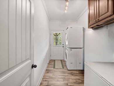 Lake Living at Its Finest! Discover this stunning 4-bedroom - photo 12