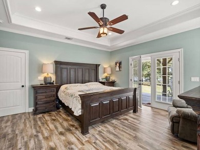Lake Living at Its Finest! Discover this stunning 4-bedroom - photo 13