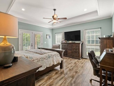 Lake Living at Its Finest! Discover this stunning 4-bedroom - photo 17