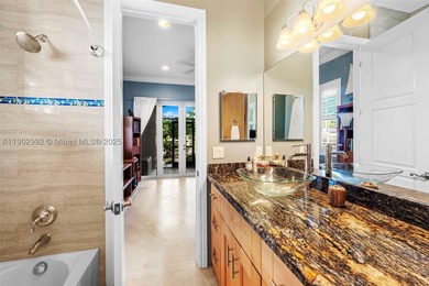 Experience refined waterfront living in this custom 5-bedroom - photo 41