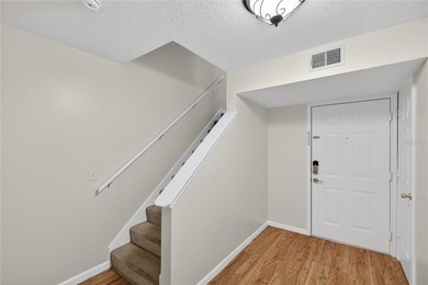 FRESHLY PAINTED AND NEW CARPETING: Beautiful townhome-style - photo 3