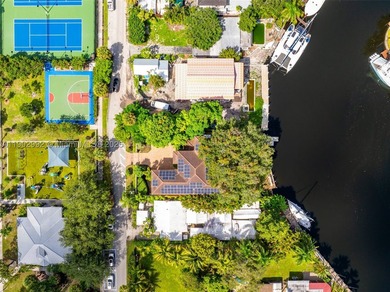 Experience refined waterfront living in this custom 5-bedroom - photo 54