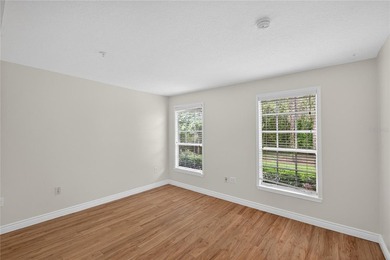 FRESHLY PAINTED AND NEW CARPETING: Beautiful townhome-style - photo 4