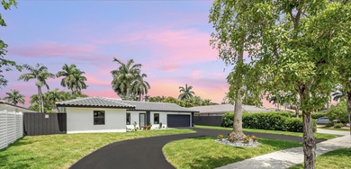 Live just minutes from the beach in this stunning fully - photo 2