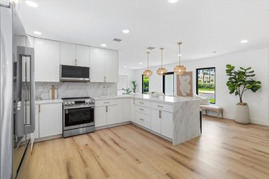 Live just minutes from the beach in this stunning fully - photo 9