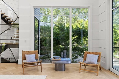 Commanding 2 sprawling acres in the heart of Southampton, this - photo 11