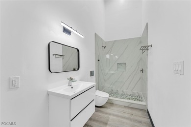 This stunning 3-bedroom, 3-bath contemporary Gulf access home