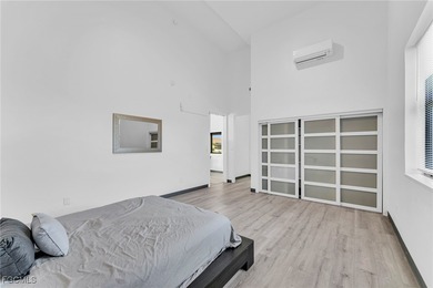 This stunning 3-bedroom, 3-bath contemporary Gulf access home