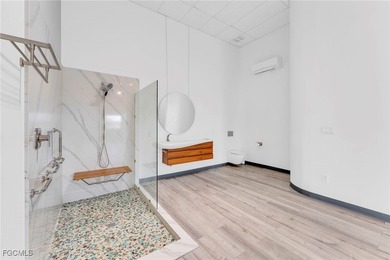 This stunning 3-bedroom, 3-bath contemporary Gulf access home